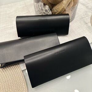 Saint Laurent Black Leather Pouch with Gold Logo